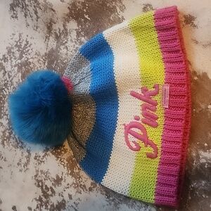 Pink Victoria's Secret winter hat with blue pom pom. Size: OS
